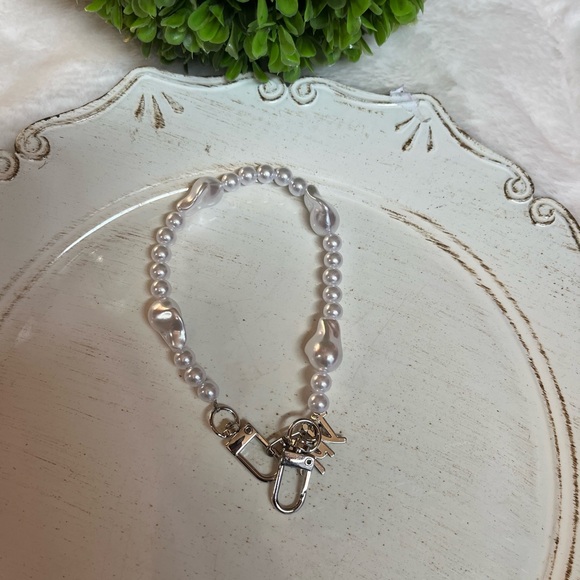 White and silver tone wristlet or bag charm - Picture 2 of 5